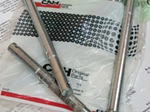 Палец консульского шнека жатки 1010, оригинал CNH
