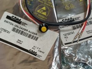 127597A1 CNH Кнопка вкл/выкл выгрузного шнека CASE